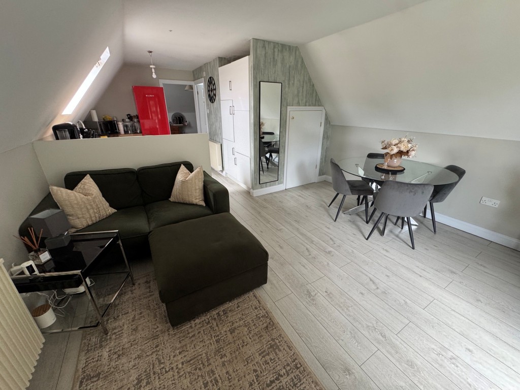 Lot: 144 - FREEHOLD DETACHED PERIOD FARMHOUSE, STUDIO APARTMENT OVER QUADRUPLE GARAGE - RESIDENTIAL INVESTMENT - Studio - open plan living room-kitchen